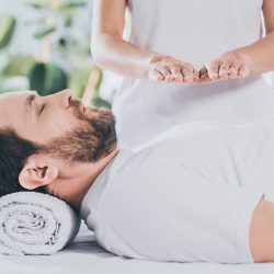 Cropped,Shot,Of,Calm,Bearded,Man,With,Closed,Eyes,Receiving